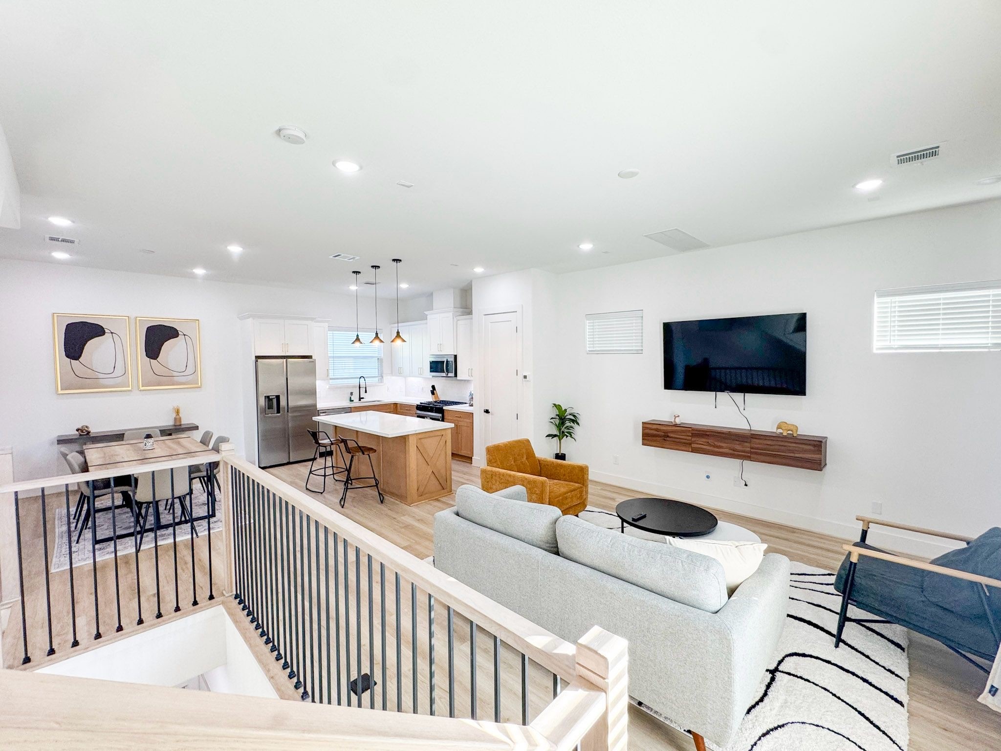 2706 Cochran Street Houston, TX 77009 - Photo 4 of 23 a living room with furniture and a flat screen tv
