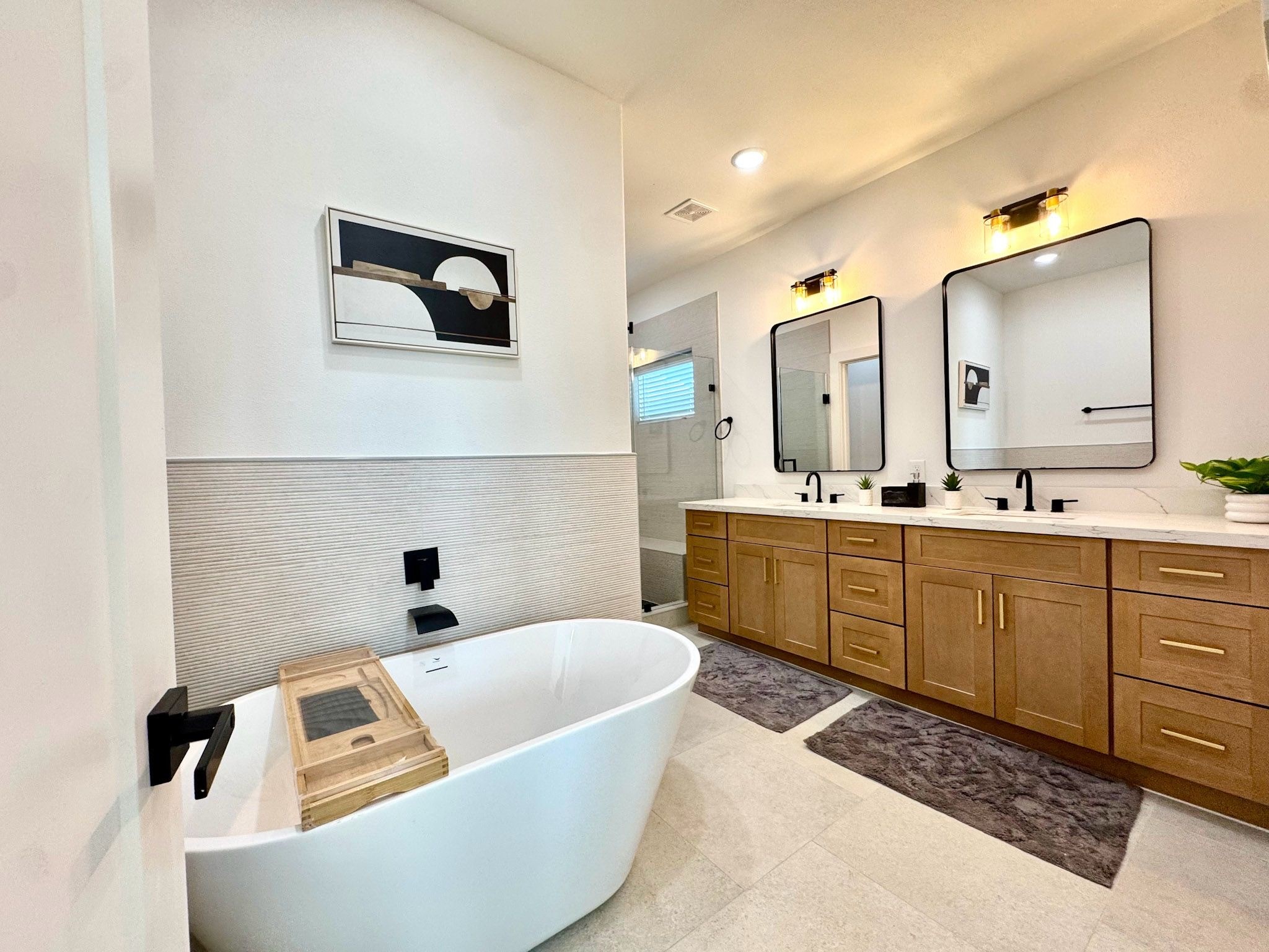 2706 Cochran Street Houston, TX 77009 - Photo 6 of 23 a bathroom with a tub a sink and mirror