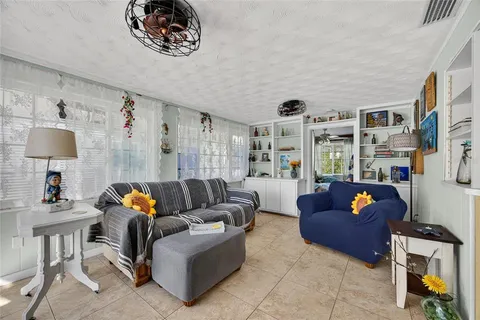 a living room with furniture and a couch