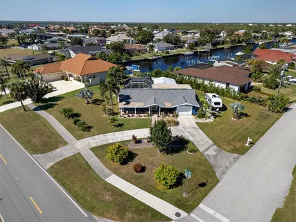 an aerial view of a house with a garden