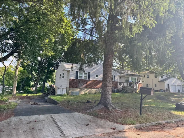 a view of a street in front of a building