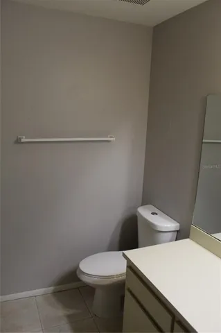 a view of a kitchen with a sink and windows