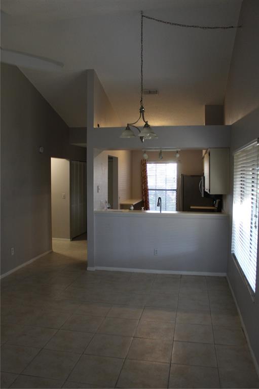 8418 Laurelon Place Temple Terrace, FL 33637 - Photo 10 of 13 a view of a kitchen with a sink and windows