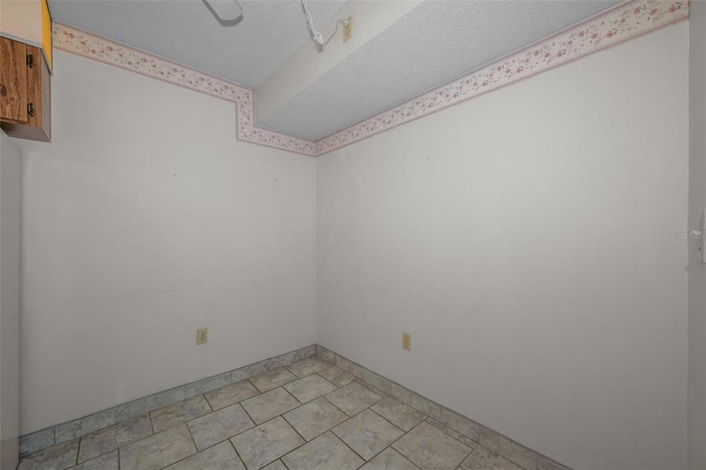2687 Pine Ridge Way South, Unit B2 Palm Harbor, FL 34684 - Photo 16 of 68 a view of a small space
