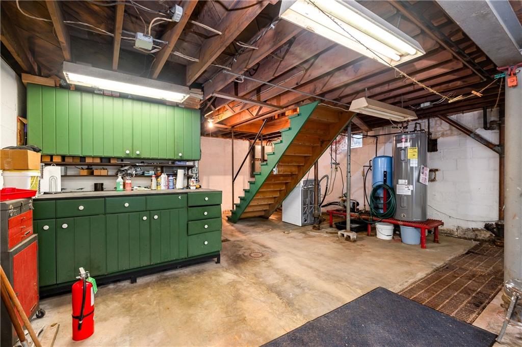 247 Welsh Road Valencia, PA 16059 - Photo 26 of 40 Double garage has inside french drains to wash your cars, etc. and work area
