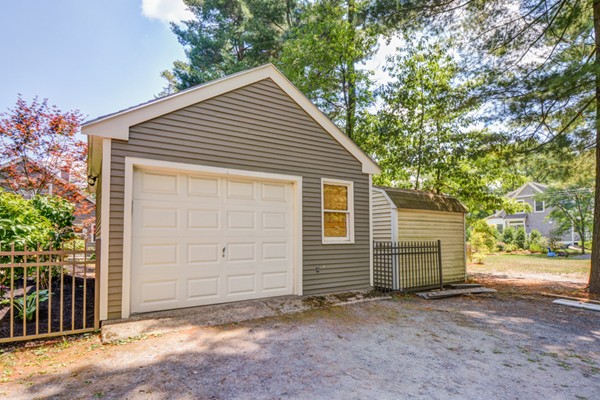 122 Barton Road Stow, MA 01775 - Photo 7 of 30 a view of a house with a garage