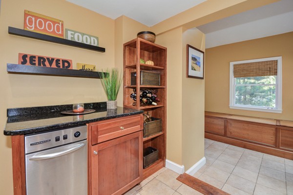 122 Barton Road Stow, MA 01775 - Photo 10 of 30 a kitchen with stainless steel appliances granite countertop a stove and a refrigerator
