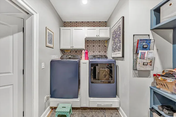 a view of a entryway with furniture and closet