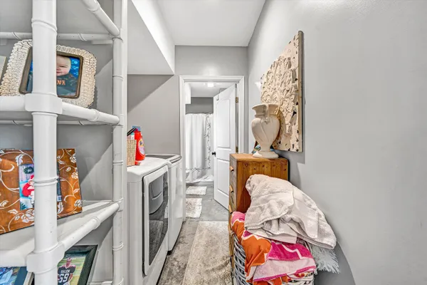 a bathroom with a sink toilet a mirror and shower