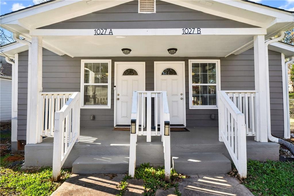 a front view of a building with porch