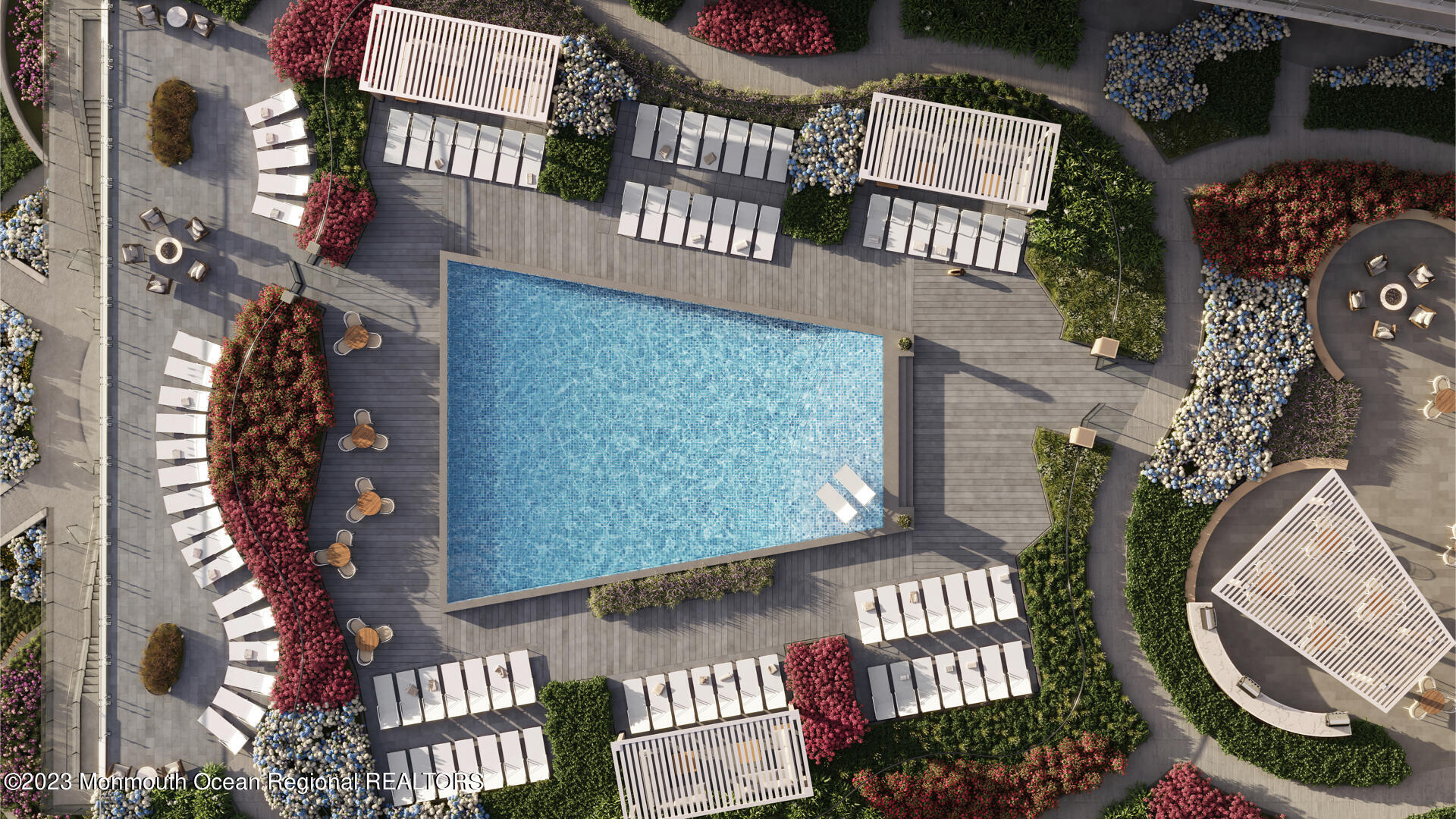an aerial view of a residential apartment building with a yard