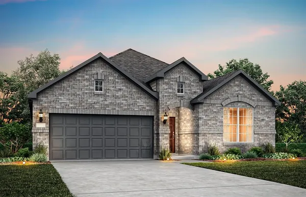 a front view of a house with a garage
