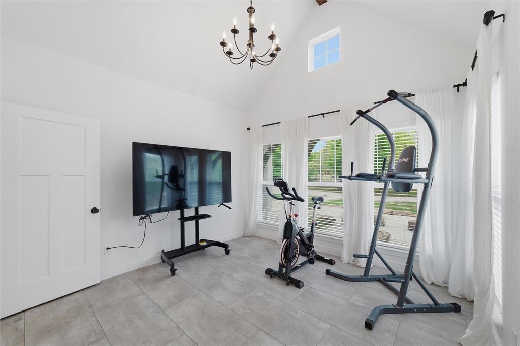 434 Sandstone Court Sunset, TX 76270 - Photo 24 of 40 a view of a room with gym equipment