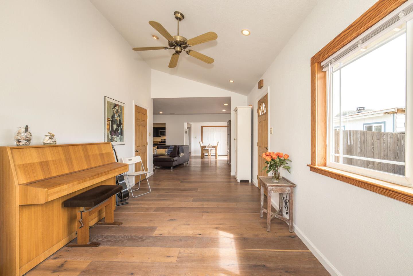365 Spruce Street Half Moon Bay, CA 94019 - Photo 16 of 34 a living room with furniture and a large window