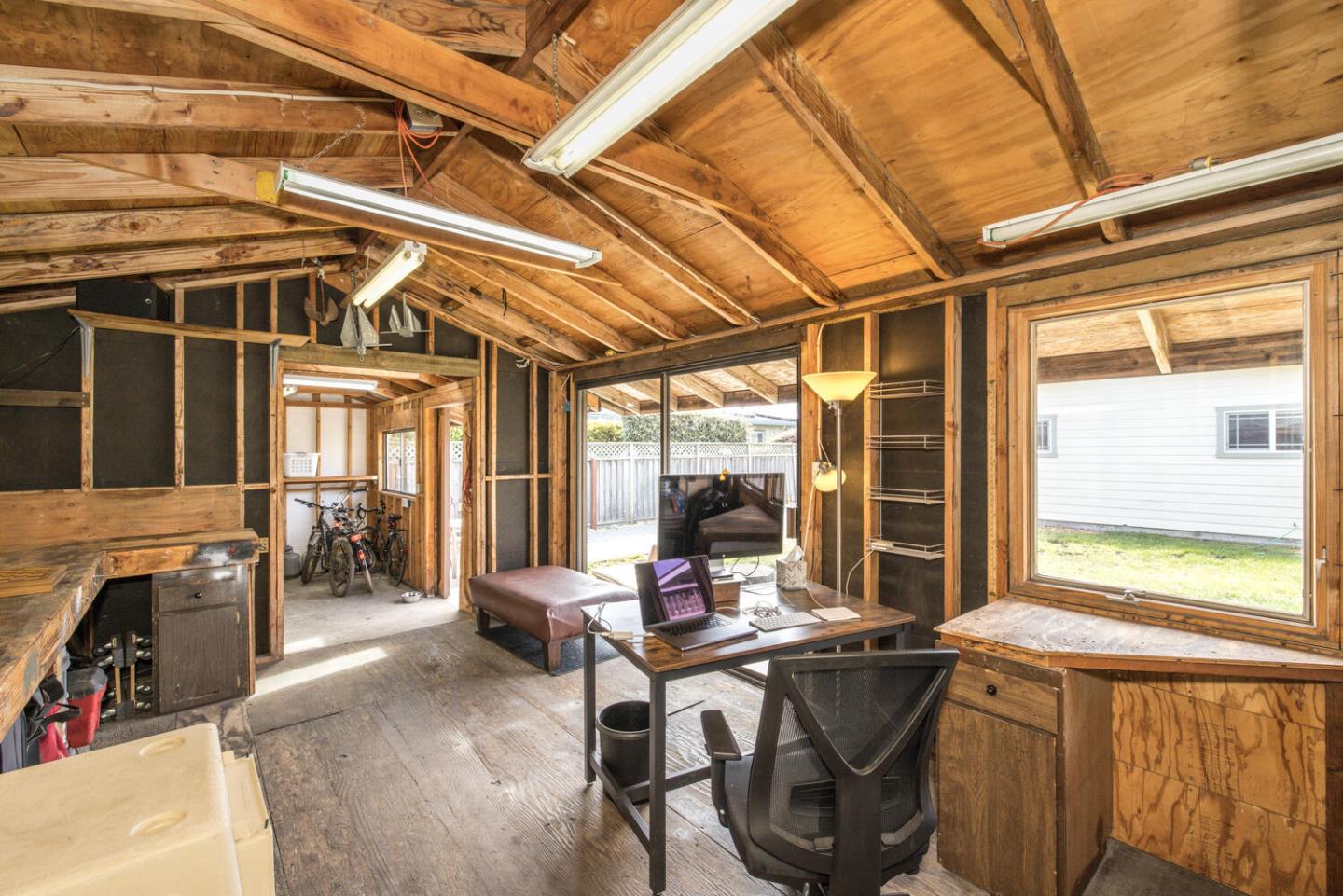 365 Spruce Street Half Moon Bay, CA 94019 - Photo 33 of 34 a view of a patio with table and chairs