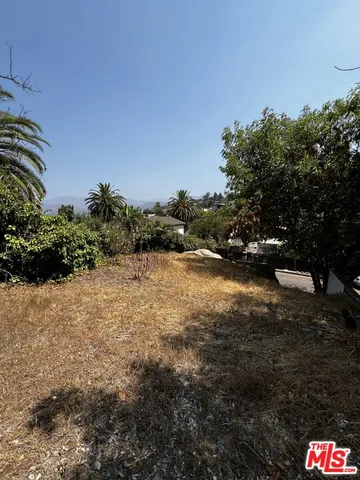 a view of outdoor space and yard