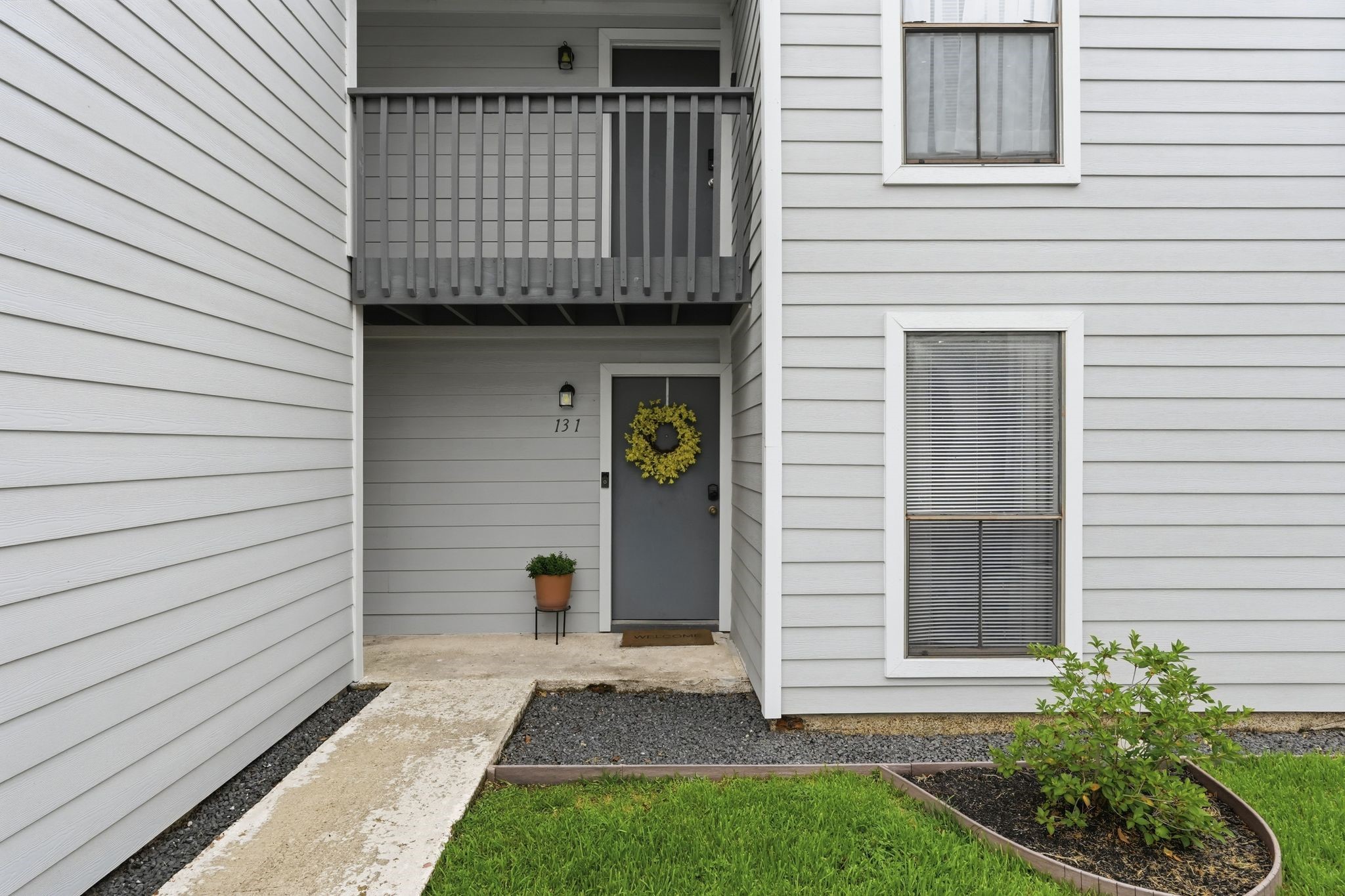 13151 Walden Road, Unit 131 Montgomery, TX 77356 - Photo 35 of 35 Attractive front entrance offering a warm welcome home.