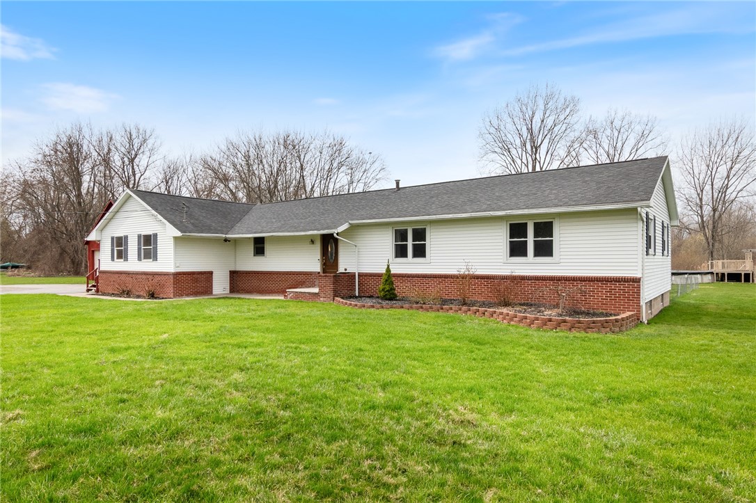 6639 Ontario Center Road Ontario, NY 14519 - Photo 1 of 1 TIMELESS BRICK FRONT RANCH HOME!