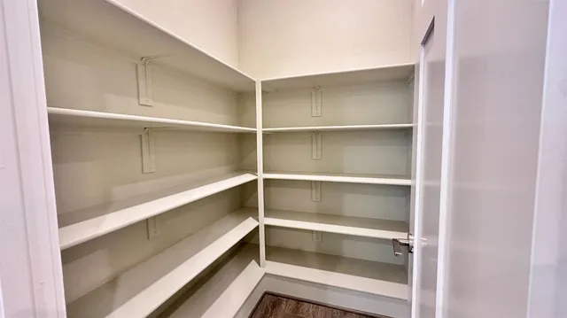 a storage room with cabinets