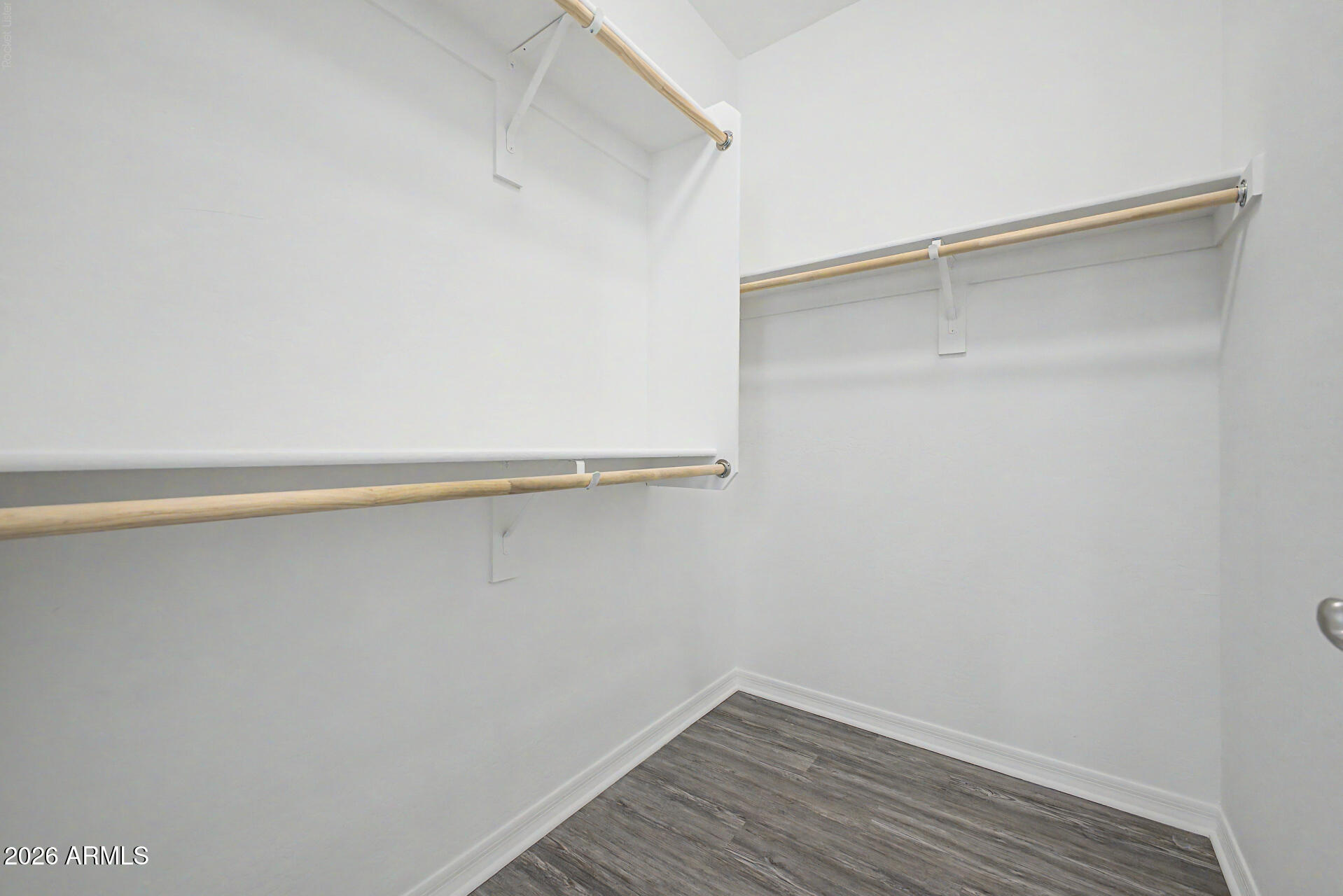 1076 East Kensington Road Gilbert, AZ 85297 - Photo 29 of 73 a view of an empty walk in closet