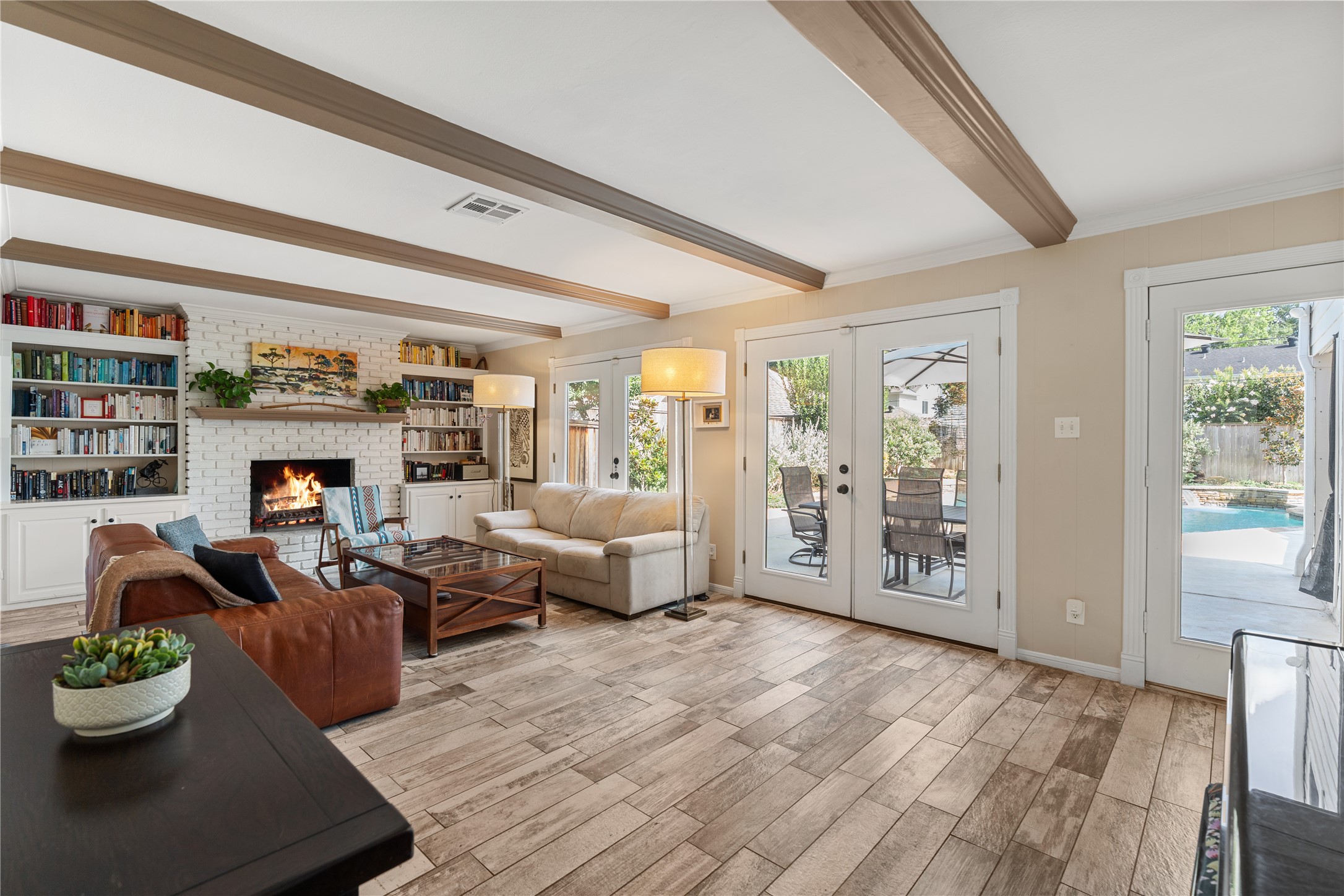 14219 Apple Tree Road Houston, TX 77079 - Photo 6 of 33 Living room with fireplace and built-ins.