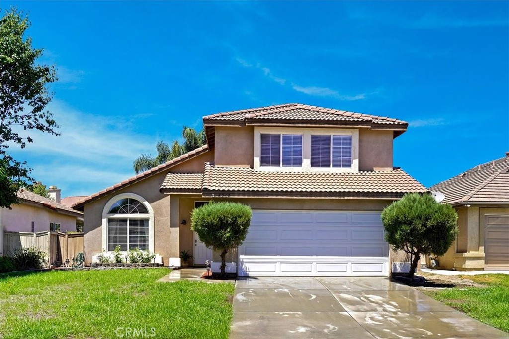 4264 Tewa Way Riverside, CA 92509 - Photo 1 of 1 a front view of a house with garden