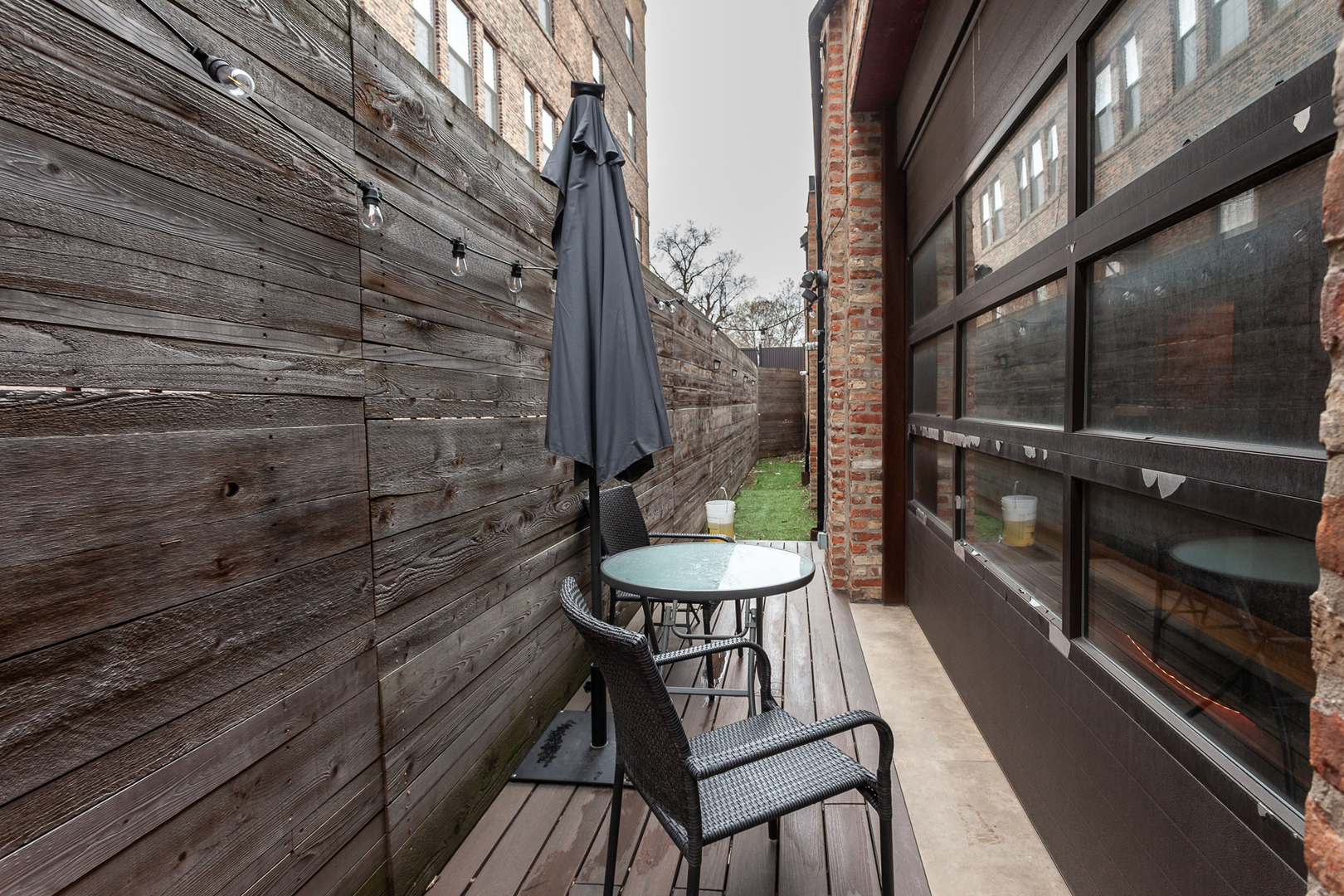 2425 West 14th Street Chicago, IL 60608 - Photo 11 of 27 a view of a balcony with chairs and table