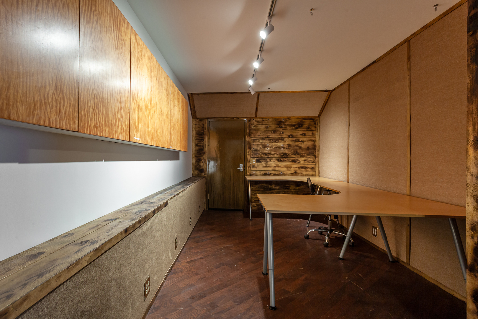 2425 West 14th Street Chicago, IL 60608 - Photo 26 of 27 a room with lots of wooden furniture and windows