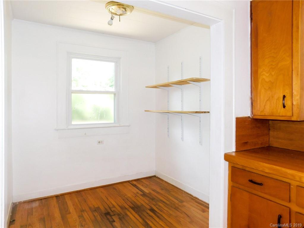 6201 Rumple Road Charlotte, NC 28262 - Photo 11 of 22 a bedroom with a bed and a window