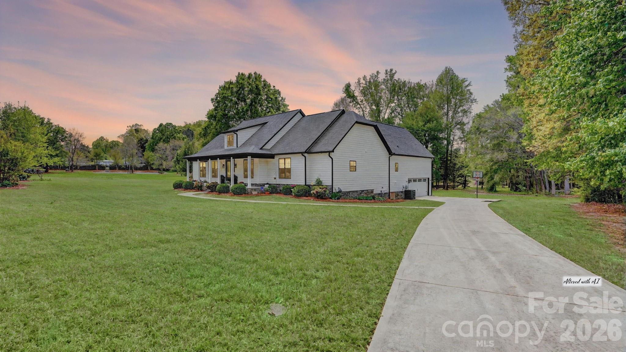 1775 Enochville Road Kannapolis, NC 28081 - Photo 21 of 41 a front view of a house with garden