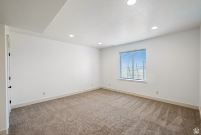 722 West Webb Circle, Unit 2 Draper, UT 84020 - Photo 17 of 39 Bright, freshly painted bedroom with recessed ceiling lighting, neutral wall finishes, and plush carpeting throughout