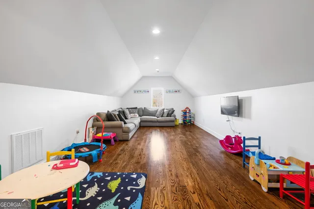a view of entryway with wooden floor
