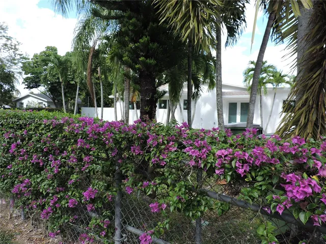 a view of outdoor space with a garden