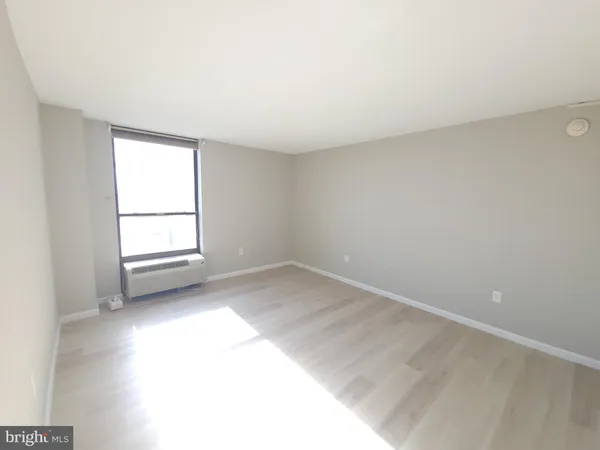 an empty room with a window