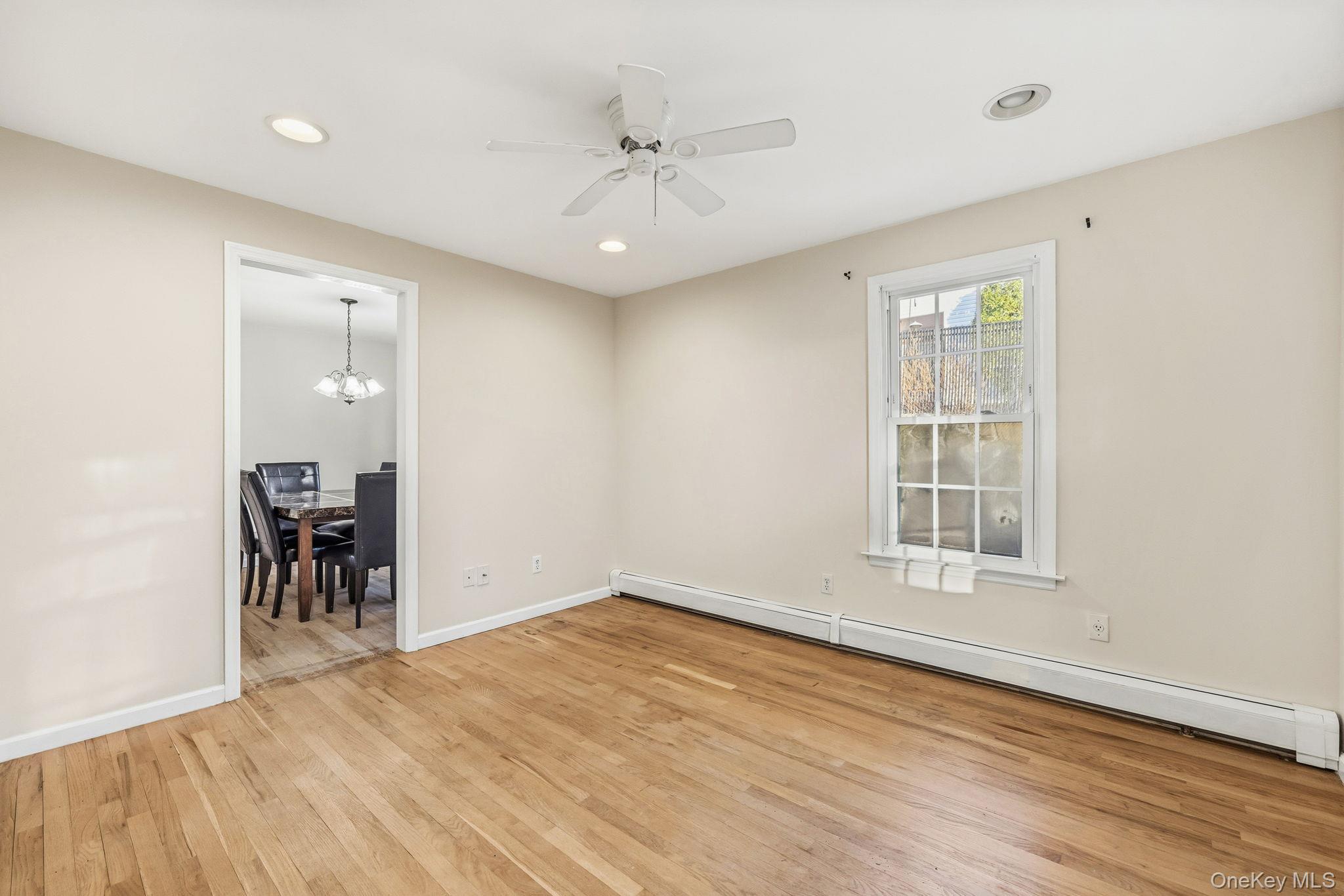 983 Warren Avenue Peekskill, NY 10566 - Photo 13 of 30 Living room with hard wood floors