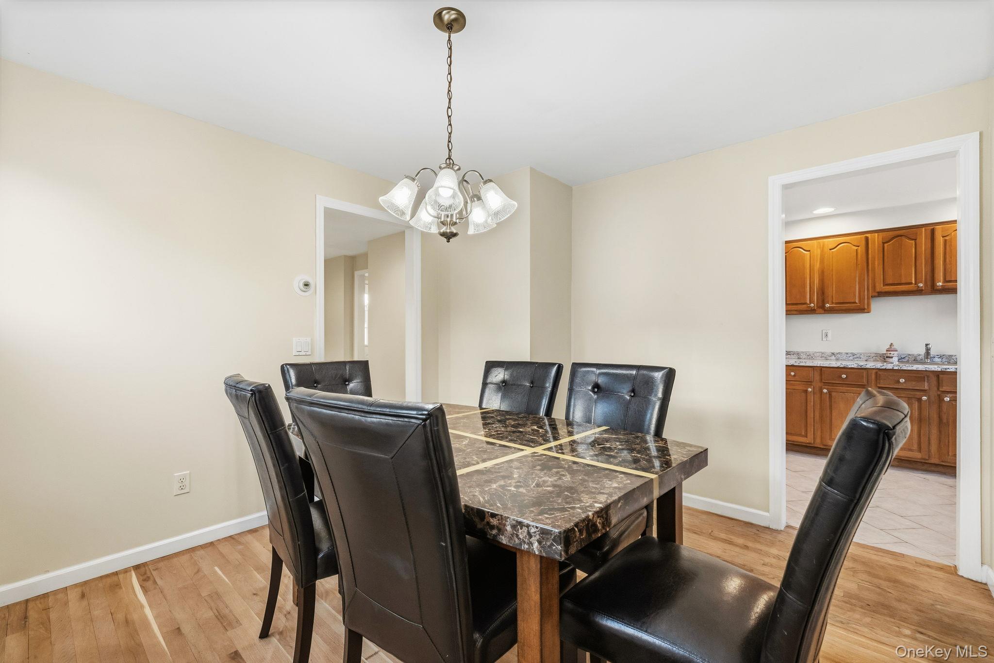 983 Warren Avenue Peekskill, NY 10566 - Photo 10 of 30 Dining Room with hard wood floors