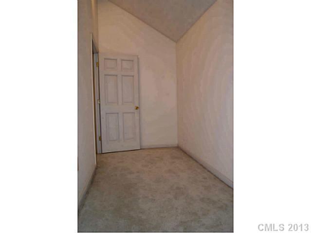 19823 Henderson Road, Unit E Cornelius, NC 28031 - Photo 7 of 14 a view of an empty room