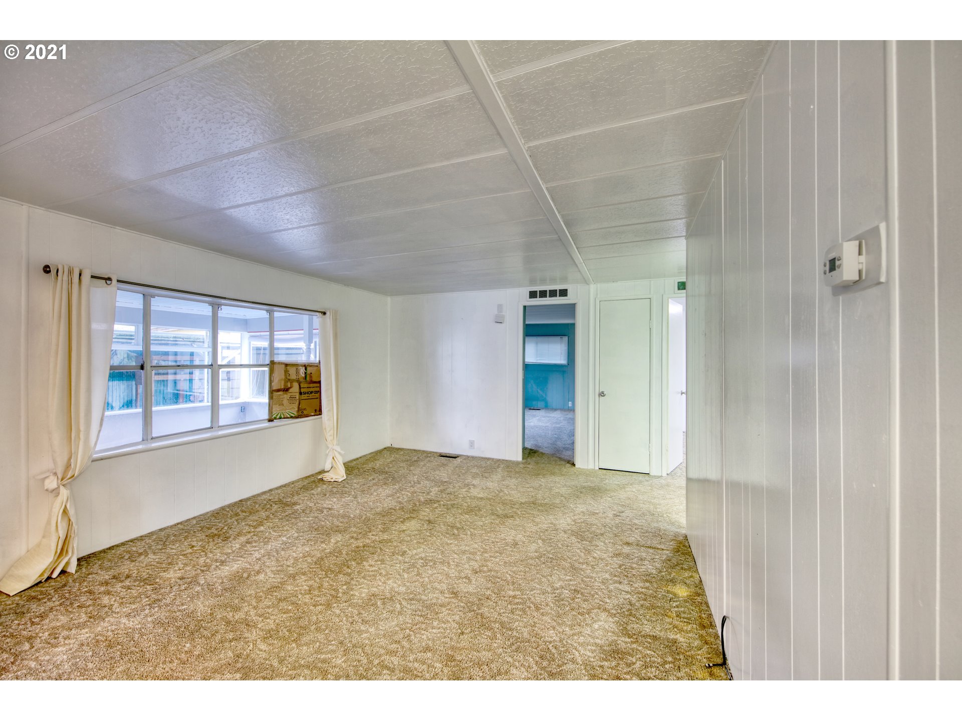 3530 Game Farm Road, Unit 46 Springfield, OR 97477 - Photo 12 of 32 a view of an empty room with a window