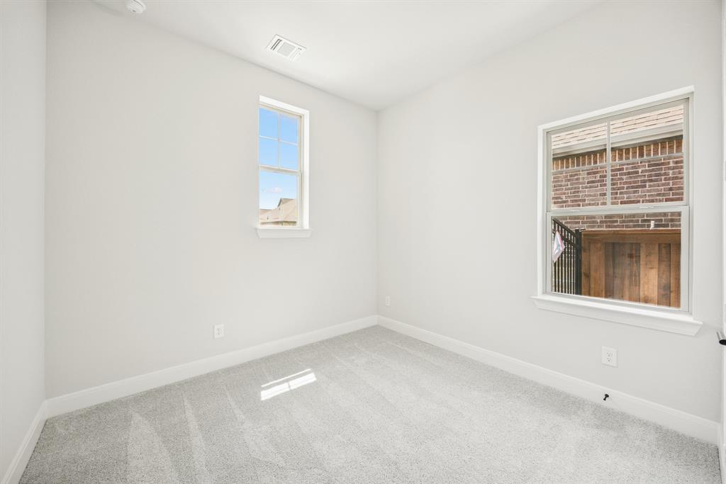 2065 Spotted Fawn Drive Arlington, TX 76005 - Photo 12 of 27 an empty room with a window