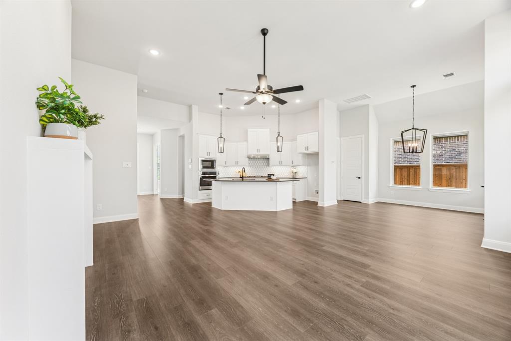 2065 Spotted Fawn Drive Arlington, TX 76005 - Photo 22 of 27 a view of an empty room with kitchen and window