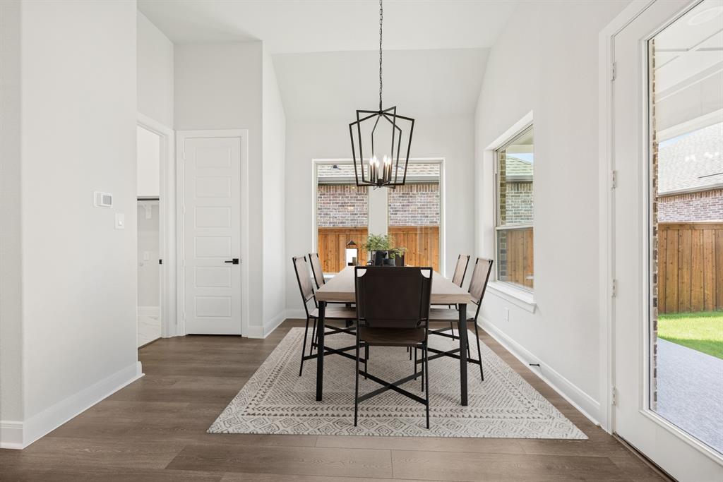 2065 Spotted Fawn Drive Arlington, TX 76005 - Photo 6 of 27 a view of a dining room with furniture window and wooden floor