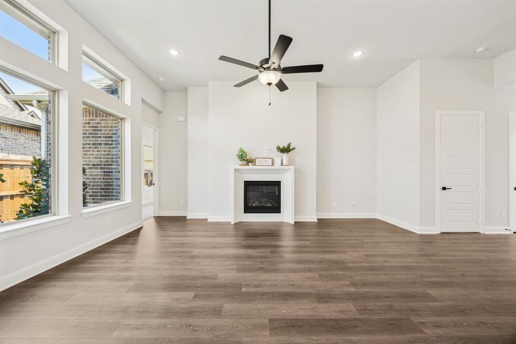 2065 Spotted Fawn Drive Arlington, TX 76005 - Photo 9 of 27 a view of an empty room with a window and fireplace