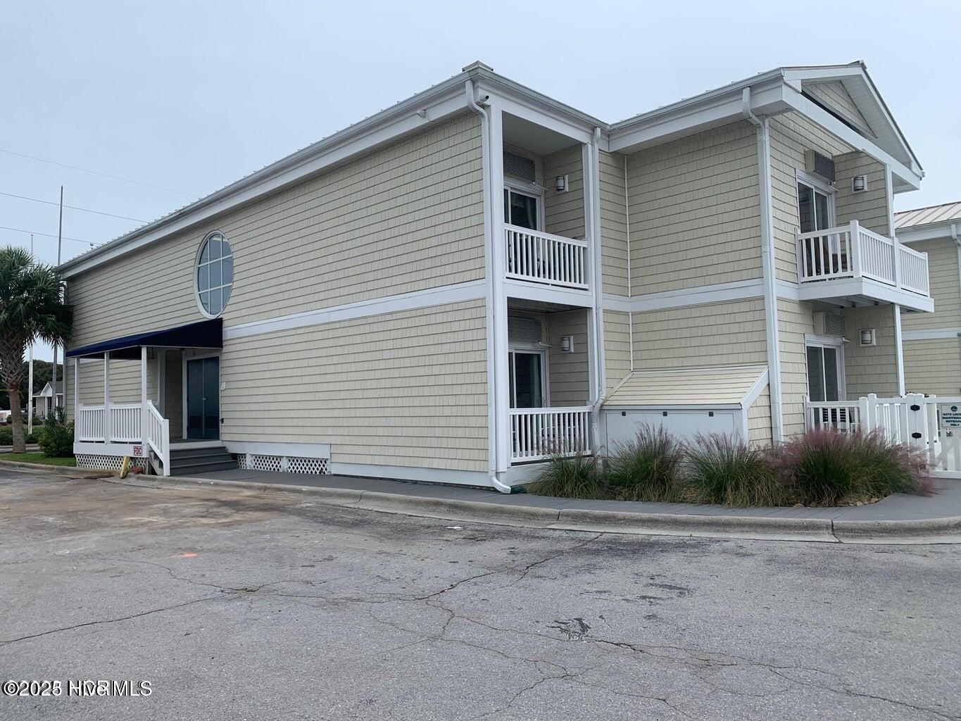 602 West Fort Macon Road, Unit 249 Atlantic Beach, NC 28512 - Photo 40 of 40 Palm Suites Side Entrance