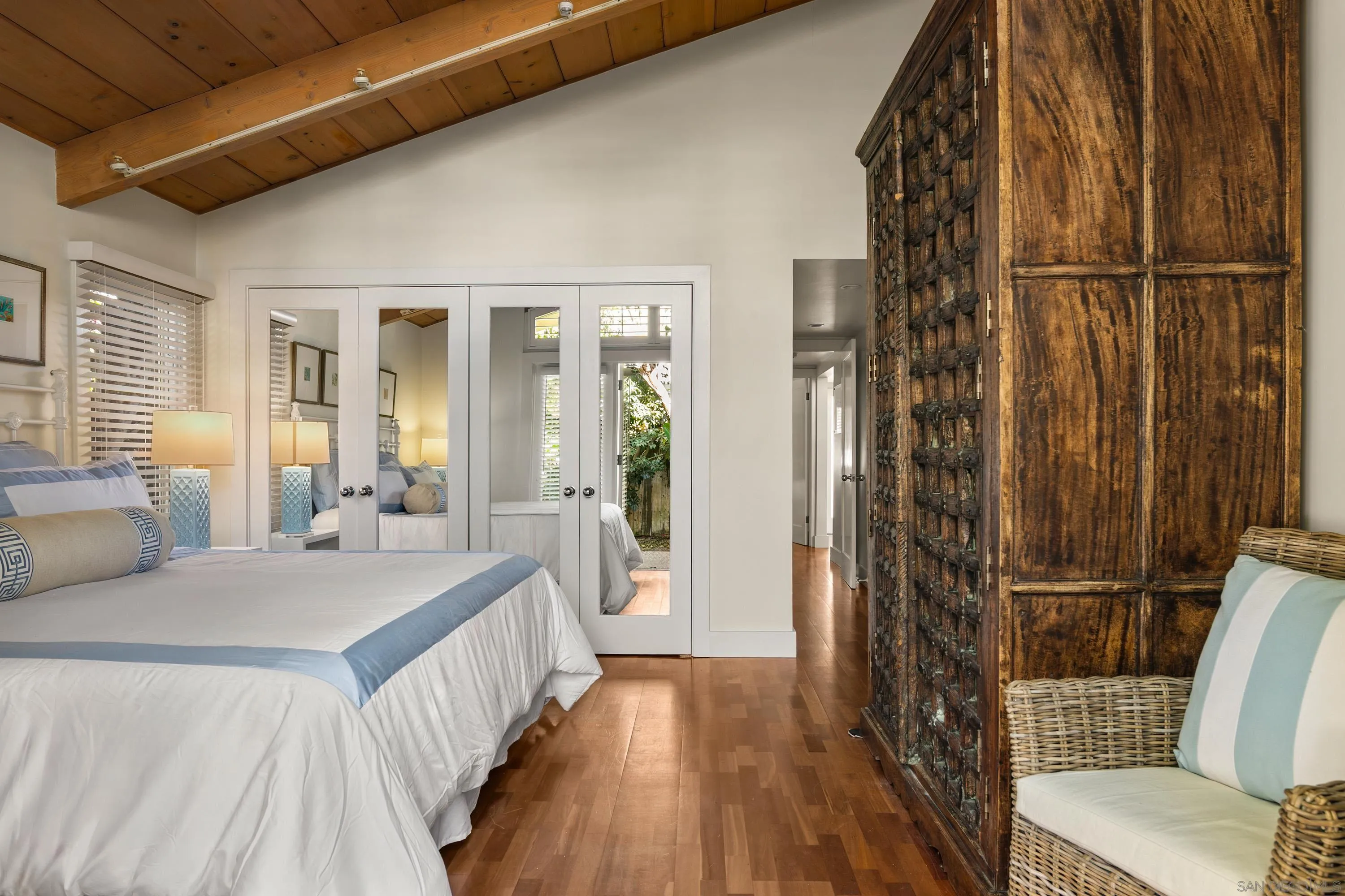 2122 Paseo Dorado La Jolla, CA 92037 - Photo 15 of 31 a bedroom with a bed and wooden floor