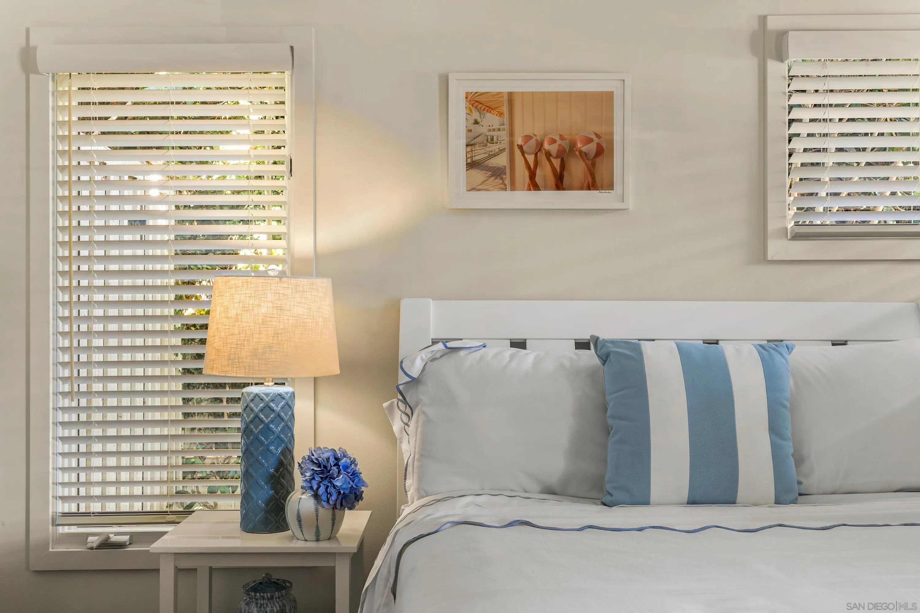 2122 Paseo Dorado La Jolla, CA 92037 - Photo 18 of 31 a bed sitting in a bedroom next to a window