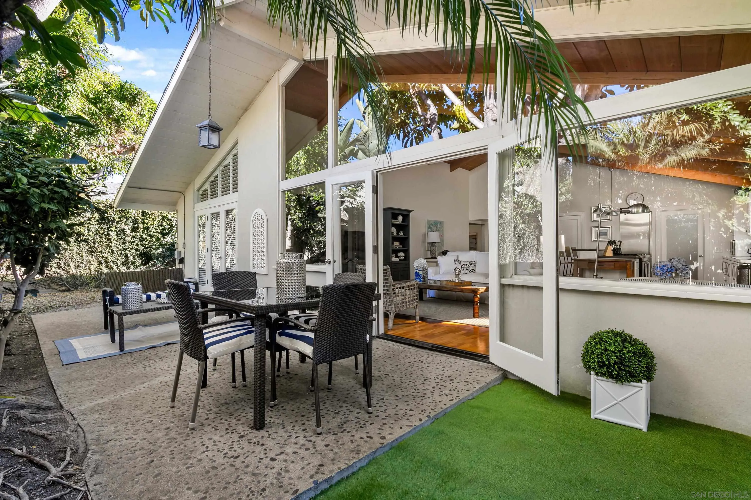2122 Paseo Dorado La Jolla, CA 92037 - Photo 22 of 31 a view of a patio with table and chairs and potted plants