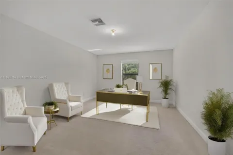 a view of a house with backyard