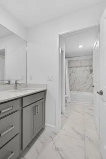 a view of an empty room with cabinet