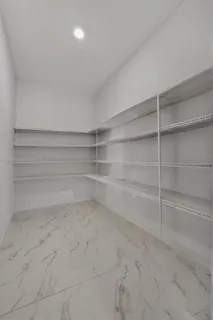 a bathroom with a sink a vanity and mirror