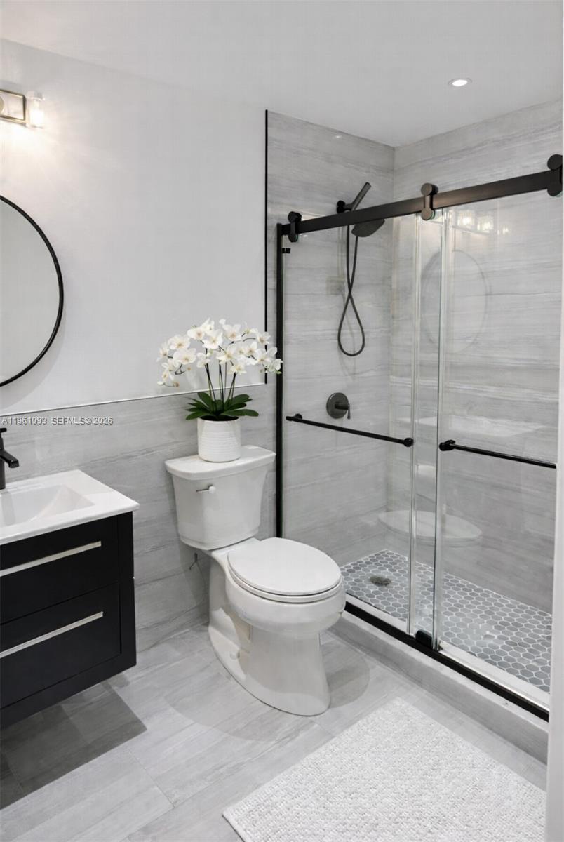 14214 Southwest 289th Terrace Homestead, FL 33033 - Photo 13 of 13 a bathroom with a sink toilet and shower